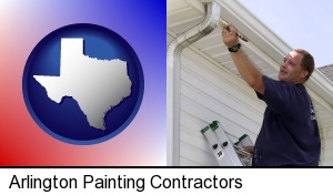 a painting contractor brushing paint on an aluminum leader in Arlington, TX