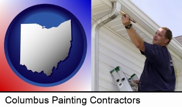 a painting contractor brushing paint on an aluminum leader in Columbus, OH