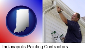 Indianapolis, Indiana - a painting contractor brushing paint on an aluminum leader