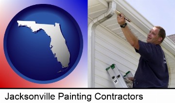 a painting contractor brushing paint on an aluminum leader in Jacksonville, FL