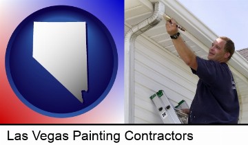 a painting contractor brushing paint on an aluminum leader in Las Vegas, NV