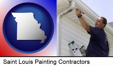 a painting contractor brushing paint on an aluminum leader in Saint Louis, MO