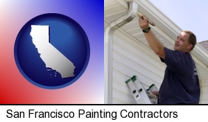 San Francisco, California - a painting contractor brushing paint on an aluminum leader