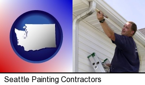 Seattle, Washington - a painting contractor brushing paint on an aluminum leader