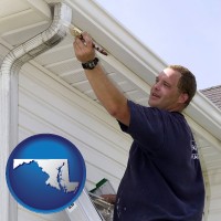 maryland map icon and a painting contractor brushing paint on an aluminum leader