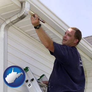 a painting contractor brushing paint on an aluminum leader - with West Virginia icon