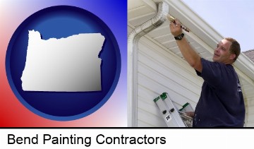 a painting contractor brushing paint on an aluminum leader in Bend, OR