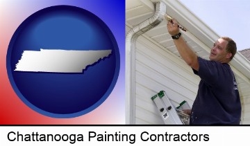 a painting contractor brushing paint on an aluminum leader in Chattanooga, TN