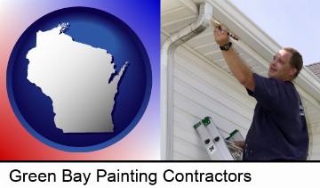 a painting contractor brushing paint on an aluminum leader in Green Bay, WI