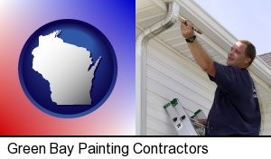 Green Bay, Wisconsin - a painting contractor brushing paint on an aluminum leader